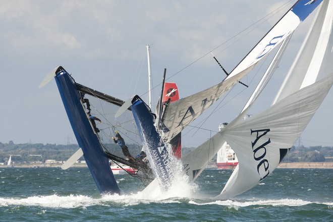 Dramatic capsize for Aberdeen Asset Management in Act 5, race 6 of day 3 at Cowes - Extreme Sailing Series © Lloyd Images http://lloydimagesgallery.photoshelter.com/